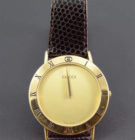 gucci watch gold black face vintage|gucci old model watches.